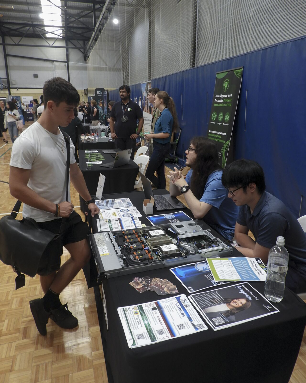 Image of the Guild Fair Stall with Milen and Kielan sitting at it