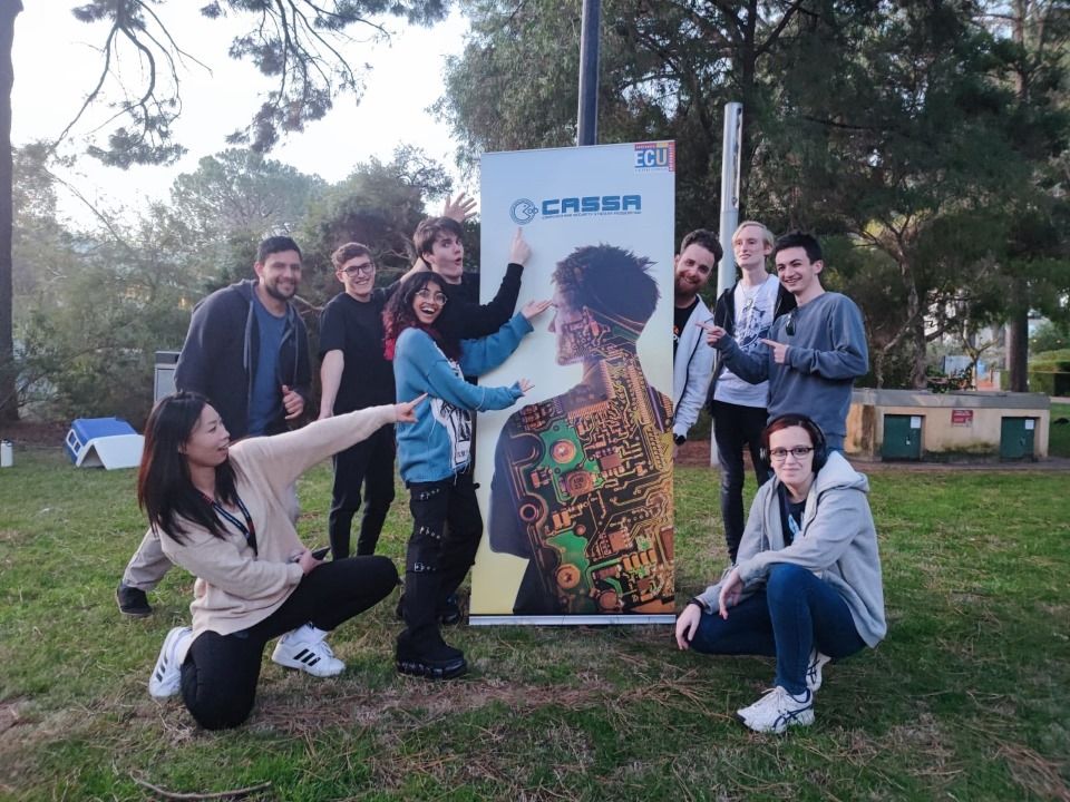 Executive Committee with traces of Michael – Left to right: Aili Lu, Wini Lambert, Michael Bodnar, Soumi Kale, Alex Hill, Kayle Baker, Miela Marshall, Shannon Castine, Lachlan Adamson